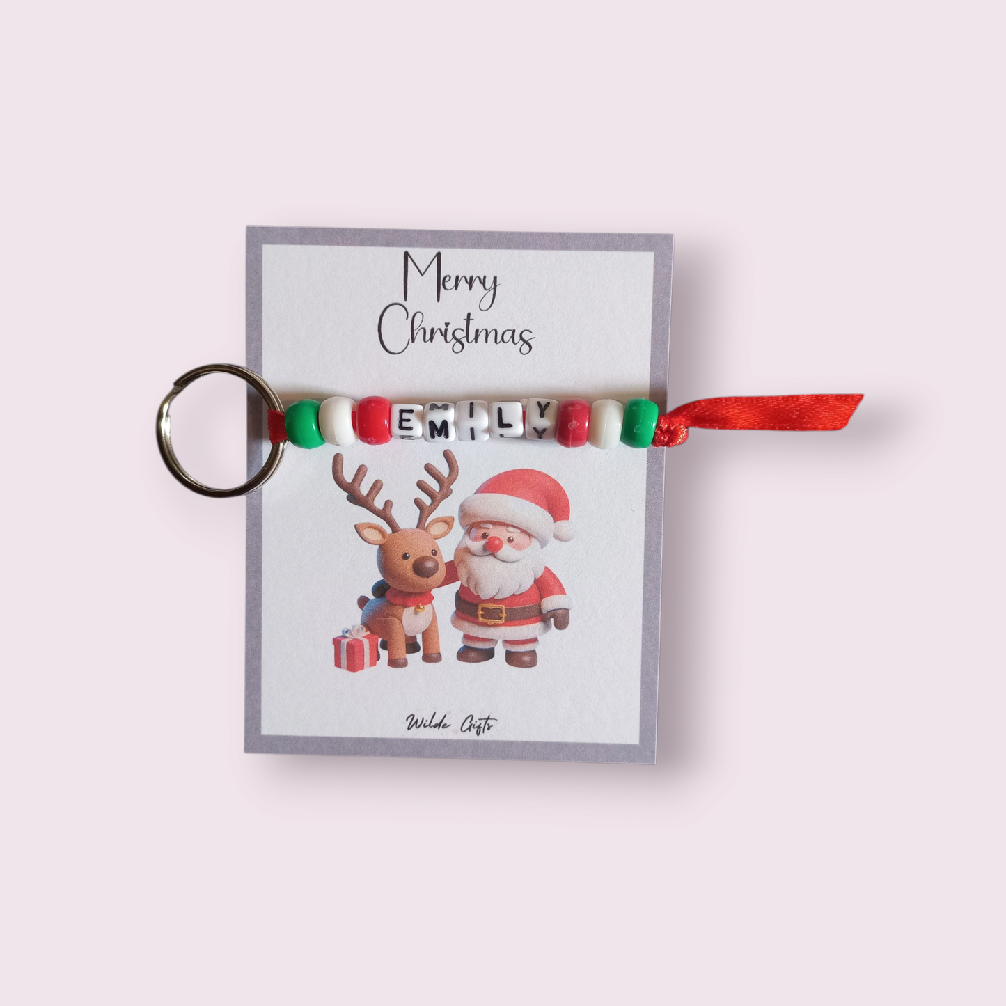 Personalised beaded Christmas keyring with a santa backing card.